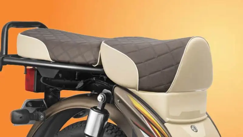 A close-up of a TVS XL 100 moped's seat