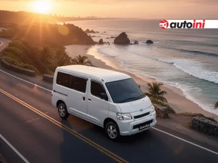 Front view of Daihatsu Gran Max MB minibus showcasing its spacious body and sleek headlights.